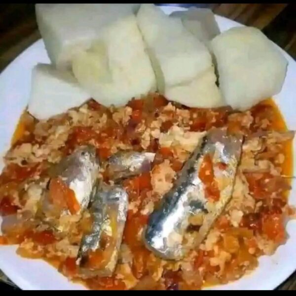 Boiled yam and sardines sauce